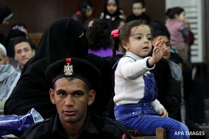 Relatives of Ansar Bait Al-Maqdis group attend their trial in Cairo on February 14, 2017, on charges of assassination of police officers, attempted assassination of interior minister Mohamed Ibrahim and explosions near s...
