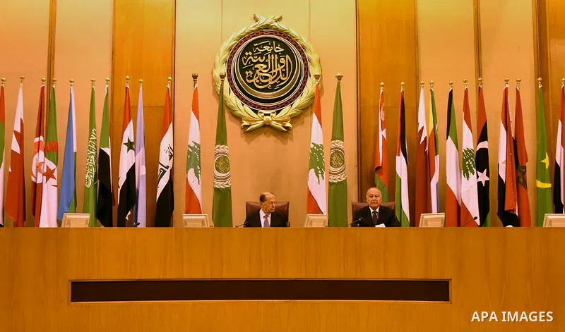 Arab League Secretary General Ahmed Abul-Gheit (R) and Lebanese President Michel Aoun sit at an Arab League meeting in Cairo on February 14, 2017. Photo by Stringer