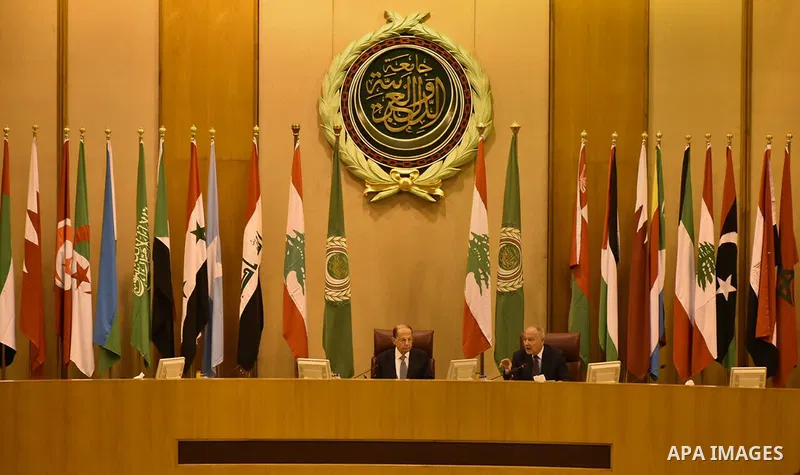 Arab League Secretary General Ahmed Abul-Gheit (R) and Lebanese President Michel Aoun sit at an Arab League meeting in Cairo on February 14, 2017. Photo by Stringer