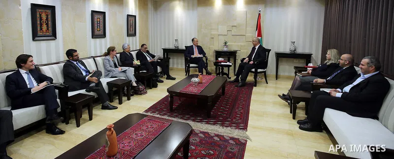 Palestinian Prime Minister, Rami Hamdallah, meets with Jim Yong Kim, World Bank President, in the West Bank city of Ramallah, on February 15, 2017. Photo by Prime Minister Office