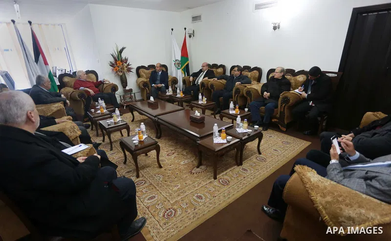 Palestinian chief of Election Commissioner, Hanna Nasser meets with members of Hamas leaders in Gaza city on February 15, 2017. Photo by Mohammed Asad