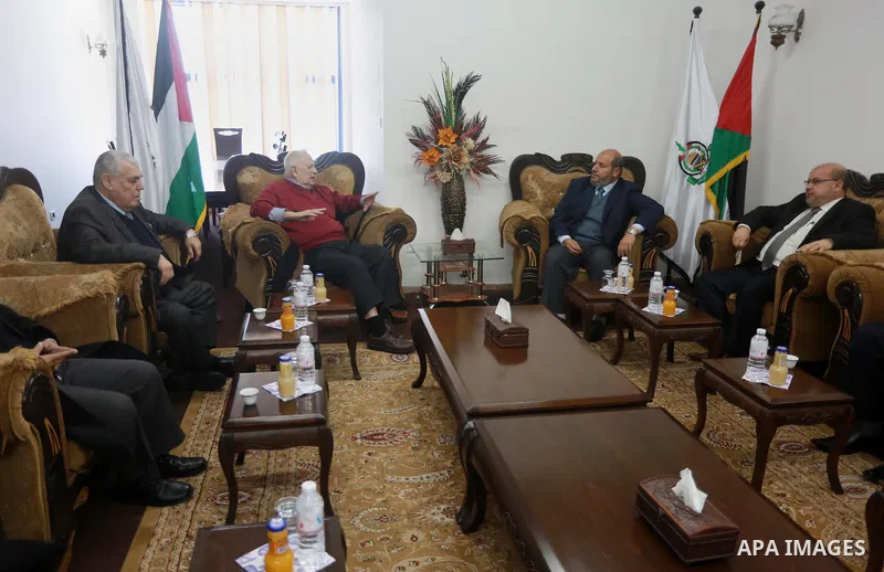 Palestinian chief of Election Commissioner, Hanna Nasser meets with members of Hamas leaders in Gaza city on February 15, 2017. Photo by Mohammed Asad