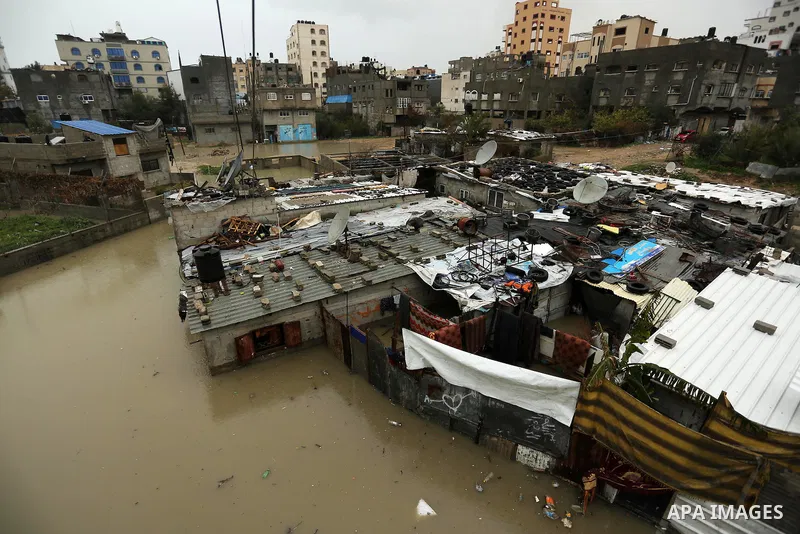 Flooded houses are seen following heavy rain in a neighbourhood in the northern Gaza Strip February 16, 2017. Photo by Ashraf Amra