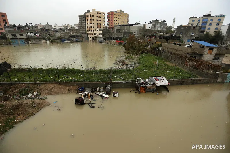 Flooded houses are seen following heavy rain in a neighbourhood in the northern Gaza Strip February 16, 2017. Photo by Ashraf Amra