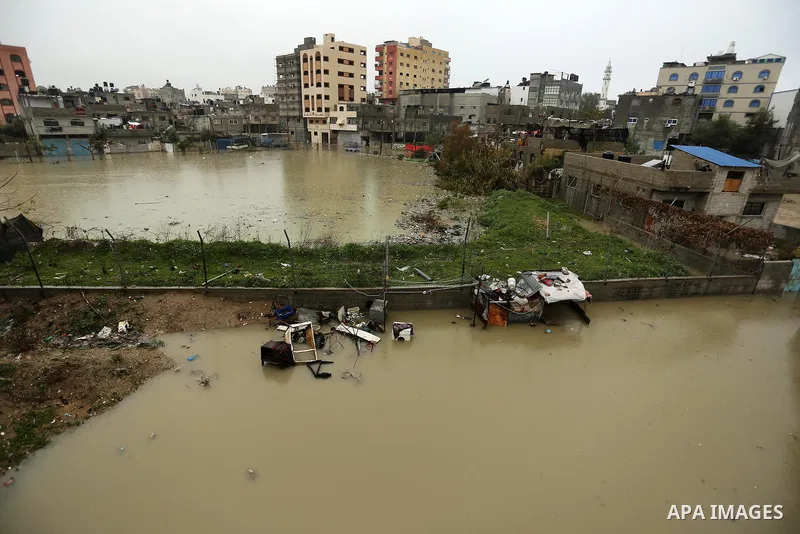 Flooded houses are seen following heavy rain in a neighbourhood in the northern Gaza Strip February 16, 2017. Photo by Ashraf Amra