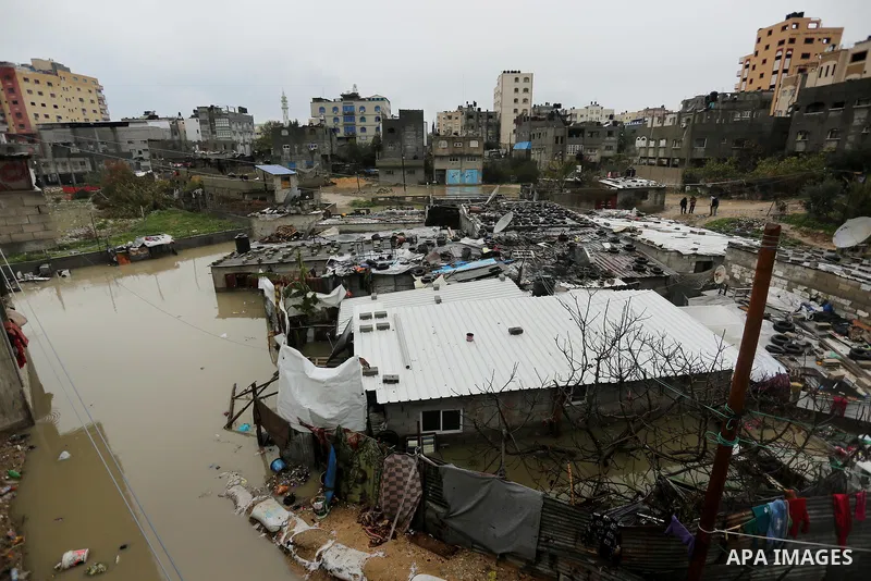Flooded houses are seen following heavy rain in a neighbourhood in the northern Gaza Strip February 16, 2017. Photo by Ashraf Amra