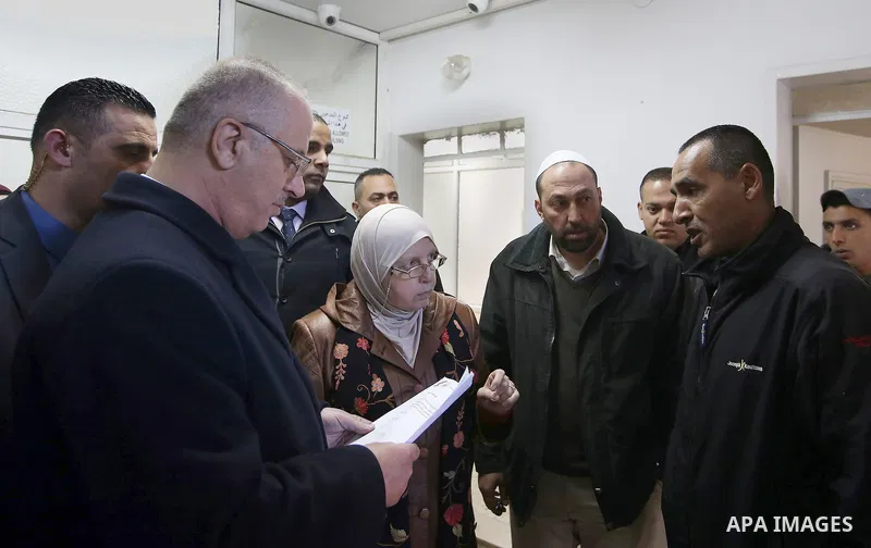 Palestinian Prime Minister Rami Hamdallah, visits medical referrals department at the Ministry of Health, in the West Bank city of Ramallah, on February 20, 2017.Photo by Prime Minister Office