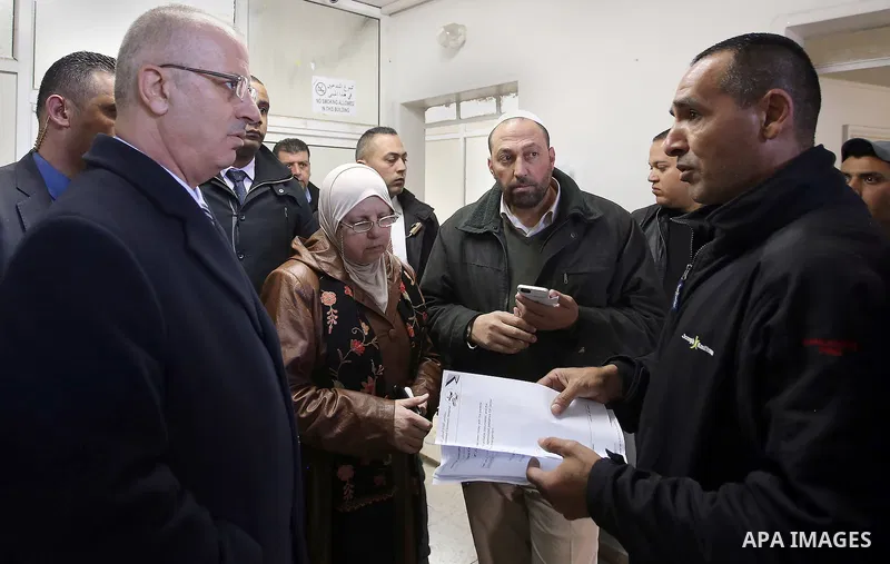 Palestinian Prime Minister Rami Hamdallah, visits medical referrals department at the Ministry of Health, in the West Bank city of Ramallah, on February 20, 2017.Photo by Prime Minister Office