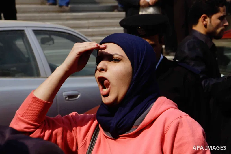 Egyptian family members of victims of the Port Said massacre react outside the Court of Cassation following the court's ruling in the case, in Cairo, on February 20, 2017. An Egyptian court upheld death sentences against...