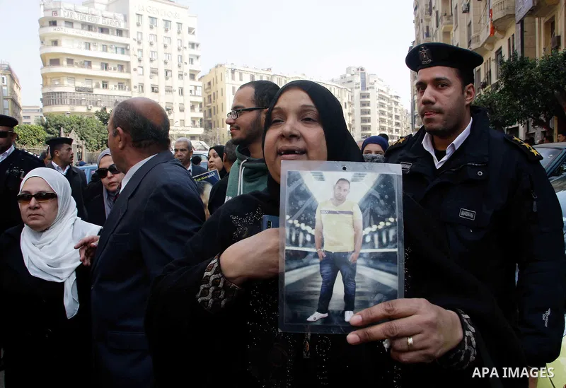 Egyptian family members of victims of the Port Said massacre react outside the Court of Cassation following the court's ruling in the case, in Cairo, on February 20, 2017. An Egyptian court upheld death sentences against...
