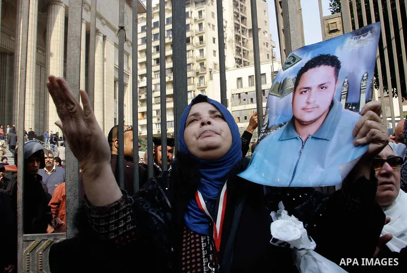 Egyptian family members of victims of the Port Said massacre react outside the Court of Cassation following the court's ruling in the case, in Cairo, on February 20, 2017. An Egyptian court upheld death sentences against...