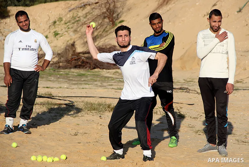 Palestinian youths take part in Baseball training, in southern Gaza strip, on February 20, 2017. Baseball is a bat-and-ball game played between two teams of nine players each, who take turns batting and fielding. Basebal...