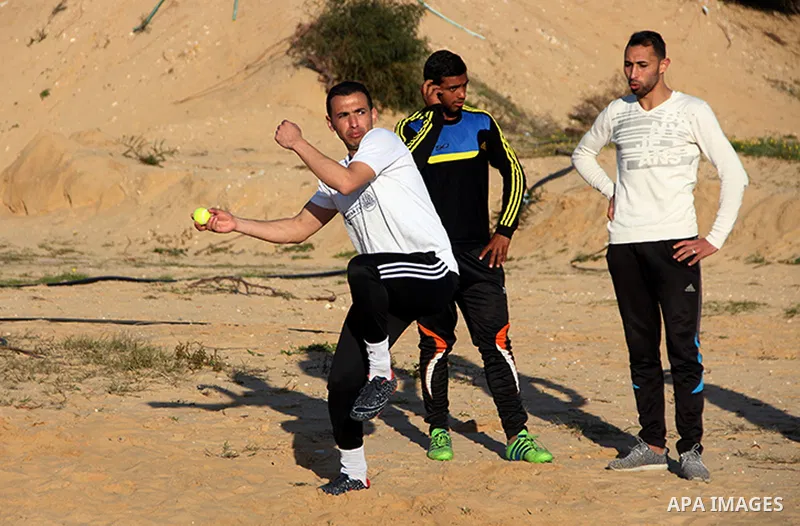 Palestinian youths take part in Baseball training, in southern Gaza strip, on February 20, 2017. Baseball is a bat-and-ball game played between two teams of nine players each, who take turns batting and fielding. Basebal...