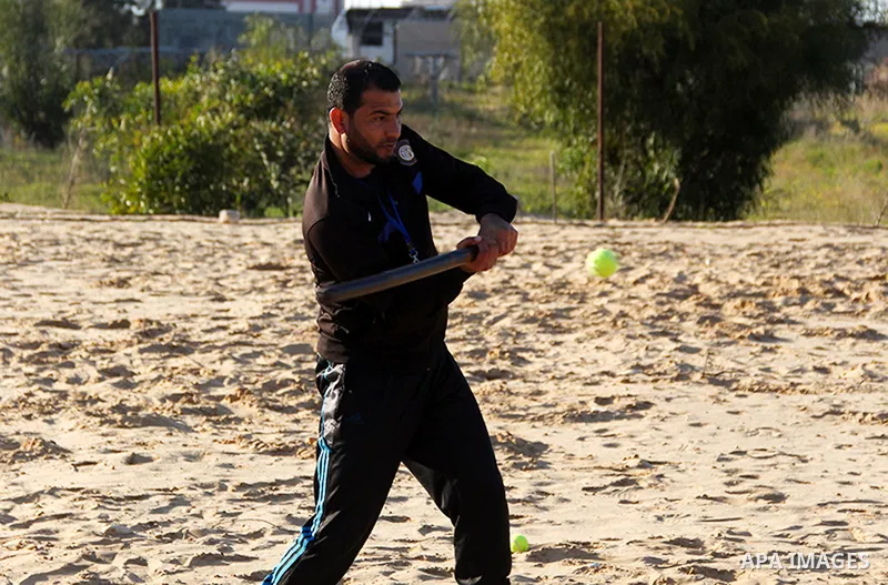 Palestinian youths take part in Baseball training, in southern Gaza strip, on February 20, 2017. Baseball is a bat-and-ball game played between two teams of nine players each, who take turns batting and fielding. Basebal...