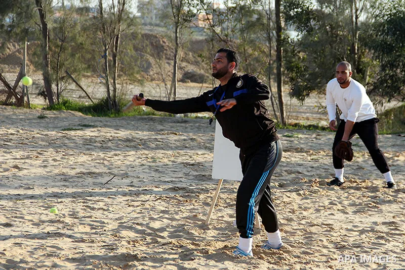 Palestinian youths take part in Baseball training, in southern Gaza strip, on February 20, 2017. Baseball is a bat-and-ball game played between two teams of nine players each, who take turns batting and fielding. Basebal...