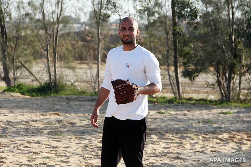 Palestinian youths take part in Baseball training, in southern Gaza strip, on February 20, 2017. Baseball is a bat-and-ball game played between two teams of nine players each, who take turns batting and fielding. Basebal...