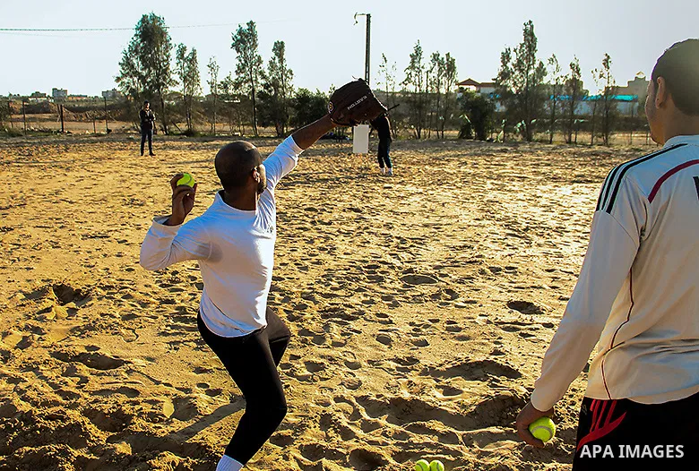 Palestinian youths take part in Baseball training, in southern Gaza strip, on February 20, 2017. Baseball is a bat-and-ball game played between two teams of nine players each, who take turns batting and fielding. Basebal...