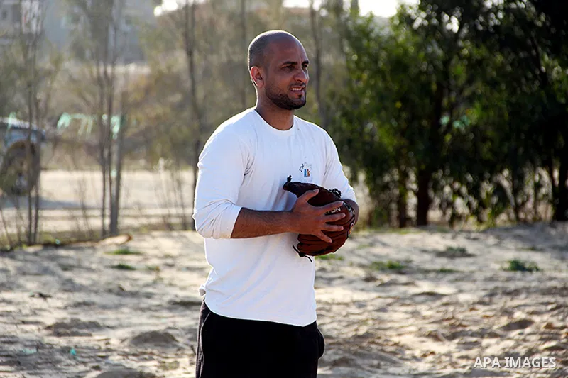 Palestinian youths take part in Baseball training, in southern Gaza strip, on February 20, 2017. Baseball is a bat-and-ball game played between two teams of nine players each, who take turns batting and fielding. Basebal...