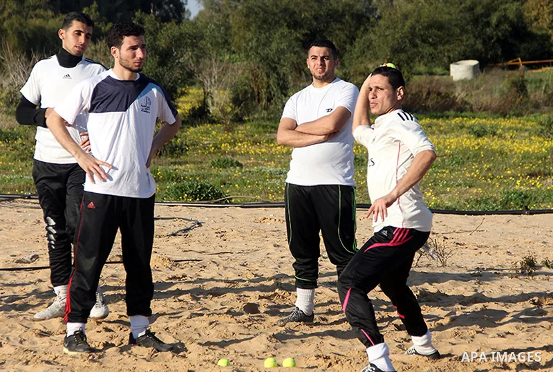 Palestinian youths take part in Baseball training, in southern Gaza strip, on February 20, 2017. Baseball is a bat-and-ball game played between two teams of nine players each, who take turns batting and fielding. Basebal...