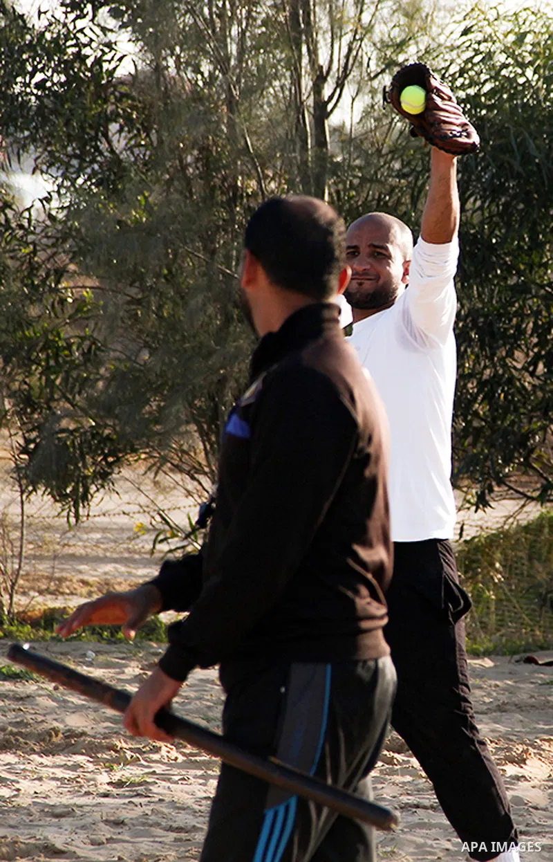 Palestinian youths take part in Baseball training, in southern Gaza strip, on February 20, 2017. Baseball is a bat-and-ball game played between two teams of nine players each, who take turns batting and fielding. Basebal...
