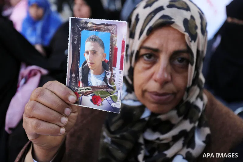 Palestinian families of martyrs take part a protest to demand their rights and salaries, in Gaza city, on February 21, 2017. Photo by Ashraf Amra