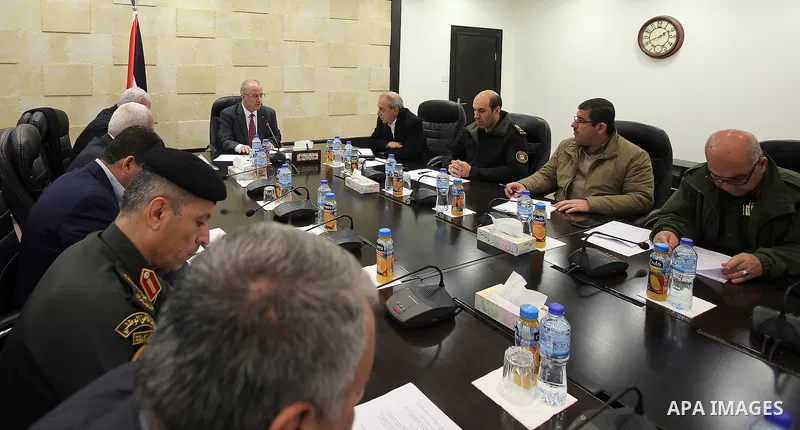Palestinian Prime Minister, Rami Hamadallah, chairs a meeting of the Security establishment leaders in the West Bank city of Ramallah, on February 21, 2017. Photo by Prime Minister Office