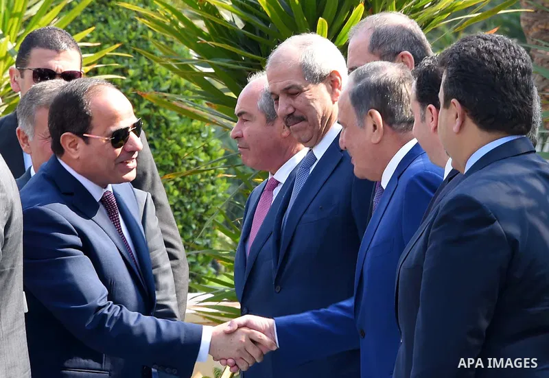 A handout picture released by the Jordanian Royal Palace on February 21, 2017, shows Jordan's King Abdullah II shaking hands with Egyptian President Abdel Fattah al-Sisi during a meeting in Cairo. Photo by Egyptian Presi...