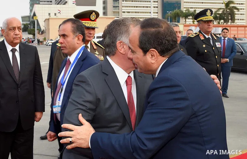 A handout picture released by the Jordanian Royal Palace on February 21, 2017, shows Jordan's King Abdullah II shaking hands with Egyptian President Abdel Fattah al-Sisi during a meeting in Cairo. Photo by Egyptian Presi...
