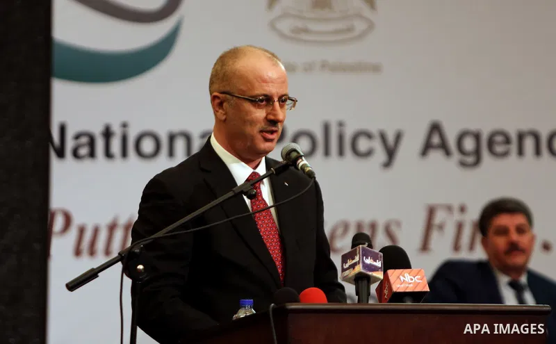 Palestinian Prime Minister Rami Hamdallah speaks during the launching ceremony of national policy agenda, in the West Bank city of Ramallah, on February 22, 2017. Photo by Prime Minister Office