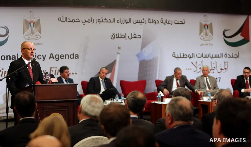 Palestinian Prime Minister Rami Hamdallah speaks during the launching ceremony of national policy agenda, in the West Bank city of Ramallah, on February 22, 2017. Photo by Prime Minister Office