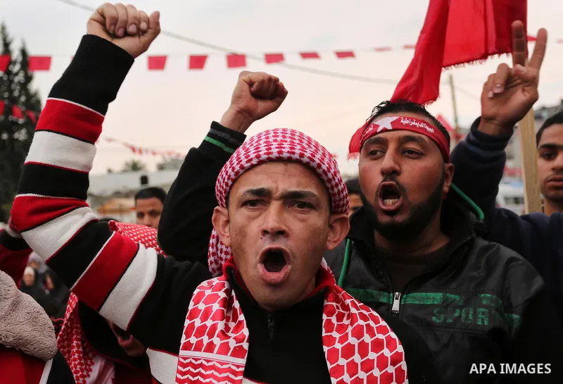 Palestinian supporters of the Democratic Front for the Liberation of Palestine (DFLP) take part in a rally marking the 48th anniversary of DFLP foundation, in Khan younis in the the southern Gaza strip on February 22, 20...