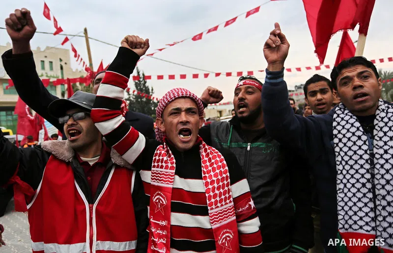 Palestinian supporters of the Democratic Front for the Liberation of Palestine (DFLP) take part in a rally marking the 48th anniversary of DFLP foundation, in Khan younis in the the southern Gaza strip on February 22, 20...
