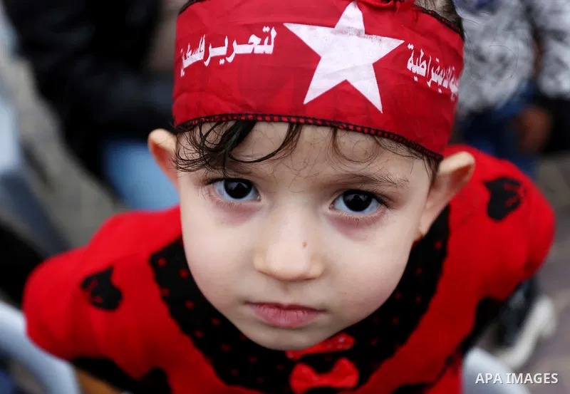 Palestinian supporters of the Democratic Front for the Liberation of Palestine (DFLP) take part in a rally marking the 48th anniversary of DFLP foundation, in Khan younis in the the southern Gaza strip on February 22, 20...