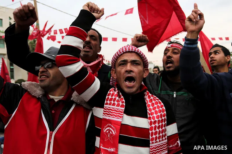 Palestinian supporters of the Democratic Front for the Liberation of Palestine (DFLP) take part in a rally marking the 48th anniversary of DFLP foundation, in Khan younis in the the southern Gaza strip on February 22, 20...
