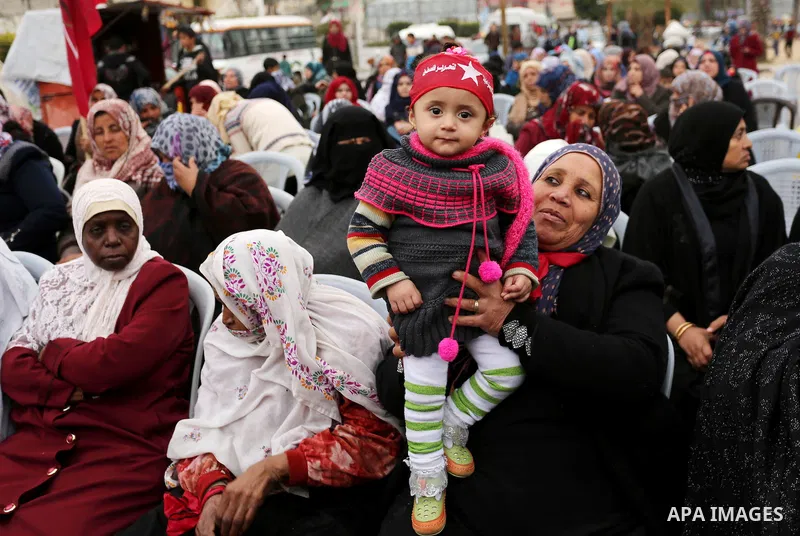 Palestinian supporters of the Democratic Front for the Liberation of Palestine (DFLP) take part in a rally marking the 48th anniversary of DFLP foundation, in Khan younis in the the southern Gaza strip on February 22, 20...