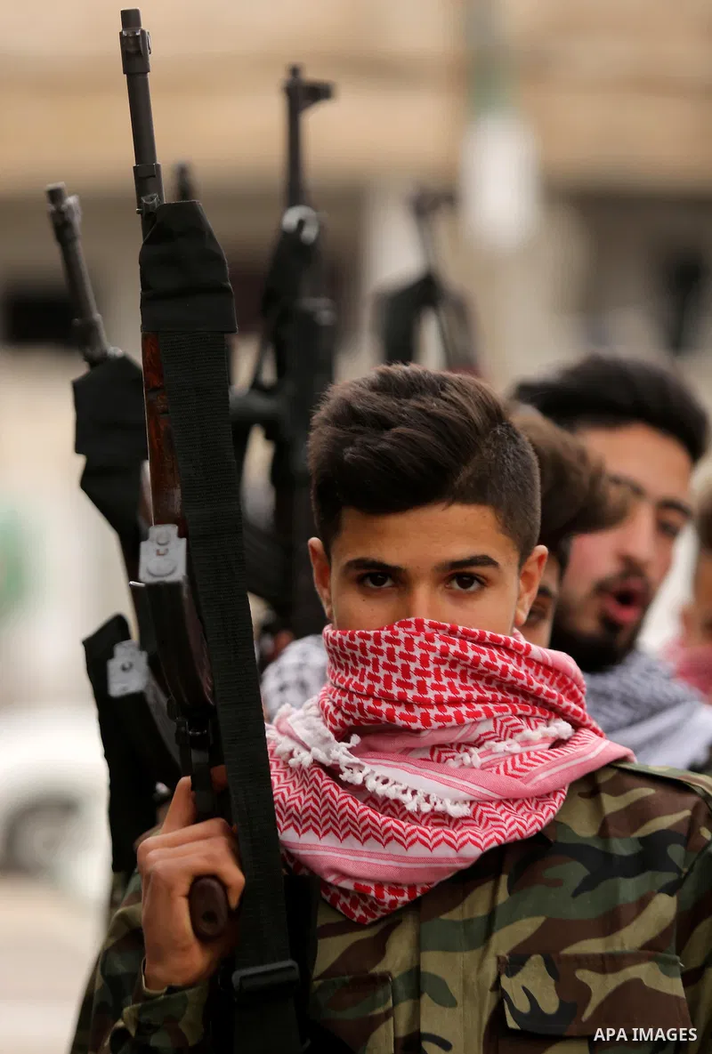 Palestinian supporters of the Democratic Front for the Liberation of Palestine (DFLP) take part in a rally marking the 48th anniversary of DFLP foundation, in Khan younis in the the southern Gaza strip on February 22, 20...