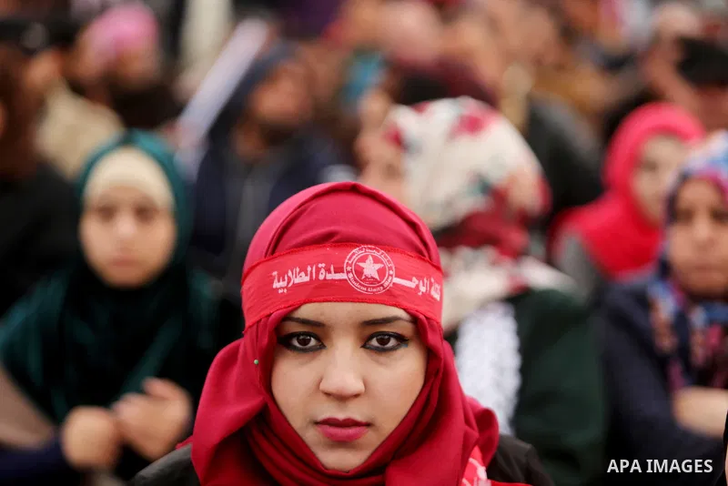 Palestinian supporters of the Democratic Front for the Liberation of Palestine (DFLP) take part in a rally marking the 48th anniversary of DFLP foundation, in Khan younis in the the southern Gaza strip on February 22, 20...