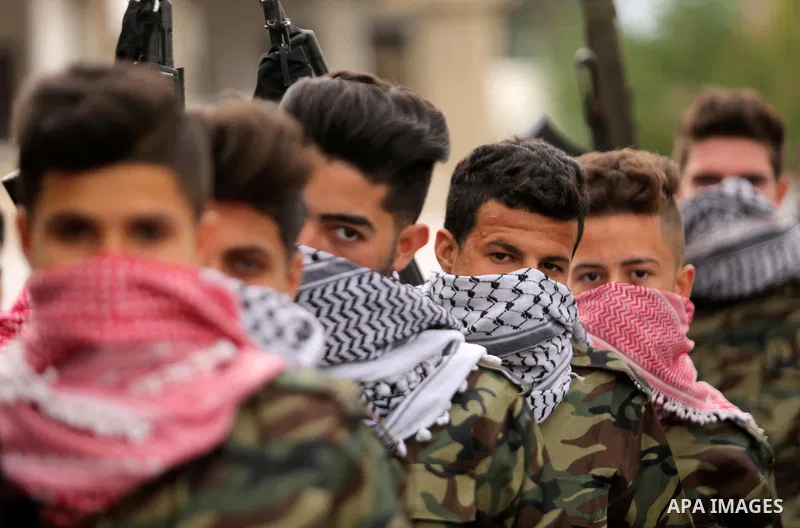 Palestinian supporters of the Democratic Front for the Liberation of Palestine (DFLP) take part in a rally marking the 48th anniversary of DFLP foundation, in Khan younis in the the southern Gaza strip on February 22, 20...