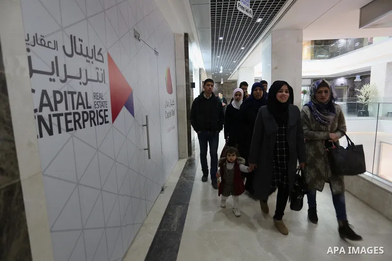 Palestinians shop in a new indoor shopping mall in the Gaza Strip, on February 23, 2017. In a welcome sign of normalcy, the first-of-its-kind indoor shopping mall -- complete with an international retail chain, three-sto...
