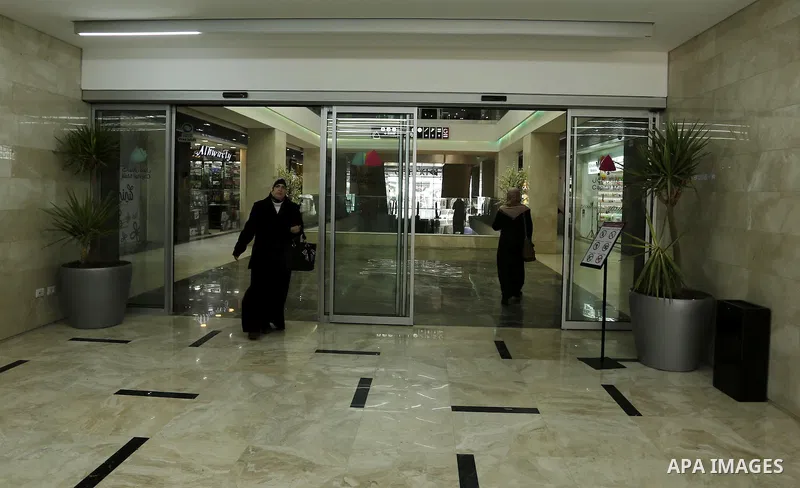 Palestinians shop in a new indoor shopping mall in the Gaza Strip, on February 23, 2017. In a welcome sign of normalcy, the first-of-its-kind indoor shopping mall -- complete with an international retail chain, three-sto...