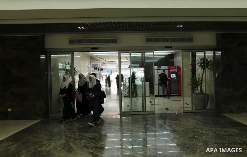 Palestinians shop in a new indoor shopping mall in the Gaza Strip, on February 23, 2017. In a welcome sign of normalcy, the first-of-its-kind indoor shopping mall -- complete with an international retail chain, three-sto...
