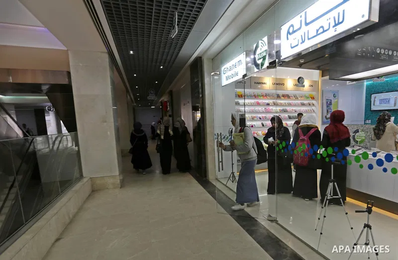 Palestinians shop in a new indoor shopping mall in the Gaza Strip, on February 23, 2017. In a welcome sign of normalcy, the first-of-its-kind indoor shopping mall -- complete with an international retail chain, three-sto...
