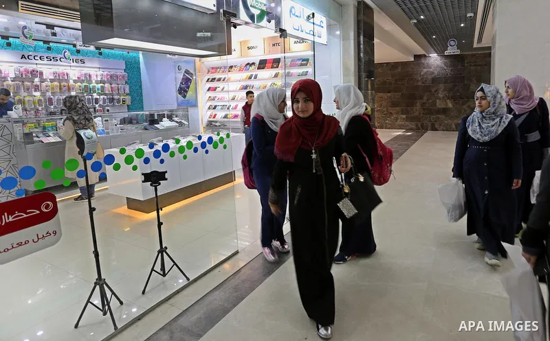 Palestinians shop in a new indoor shopping mall in the Gaza Strip, on February 23, 2017. In a welcome sign of normalcy, the first-of-its-kind indoor shopping mall -- complete with an international retail chain, three-sto...