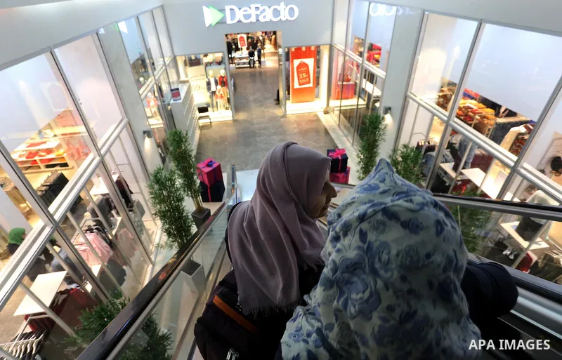 Palestinians shop in a new indoor shopping mall in the Gaza Strip, on February 23, 2017. In a welcome sign of normalcy, the first-of-its-kind indoor shopping mall -- complete with an international retail chain, three-sto...