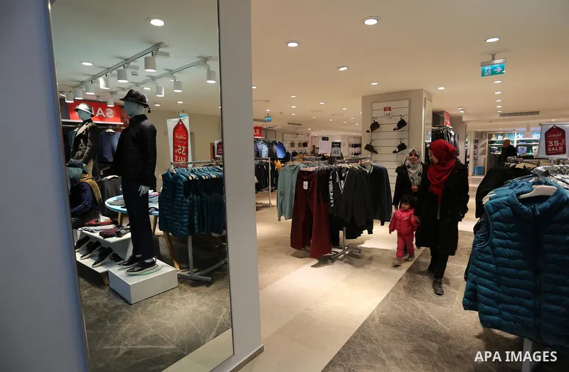 Palestinians shop in a new indoor shopping mall in the Gaza Strip, on February 23, 2017. In a welcome sign of normalcy, the first-of-its-kind indoor shopping mall -- complete with an international retail chain, three-sto...