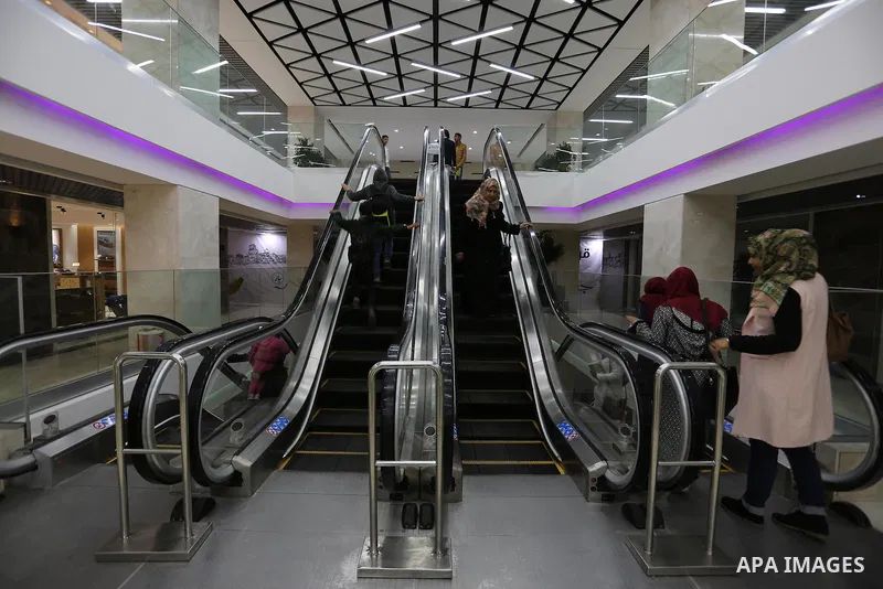 Palestinians shop in a new indoor shopping mall in the Gaza Strip, on February 23, 2017. In a welcome sign of normalcy, the first-of-its-kind indoor shopping mall -- complete with an international retail chain, three-sto...