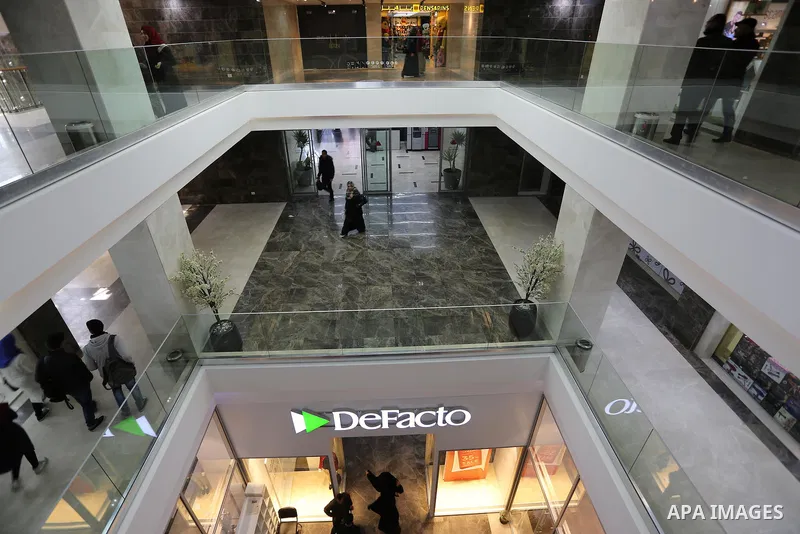 Palestinians shop in a new indoor shopping mall in the Gaza Strip, on February 23, 2017. In a welcome sign of normalcy, the first-of-its-kind indoor shopping mall -- complete with an international retail chain, three-sto...