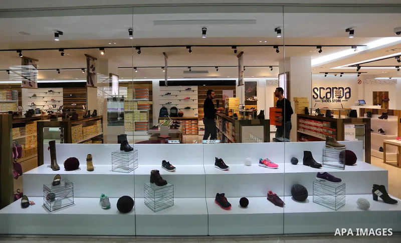 Palestinians shop in a new indoor shopping mall in the Gaza Strip, on February 23, 2017. In a welcome sign of normalcy, the first-of-its-kind indoor shopping mall -- complete with an international retail chain, three-sto...
