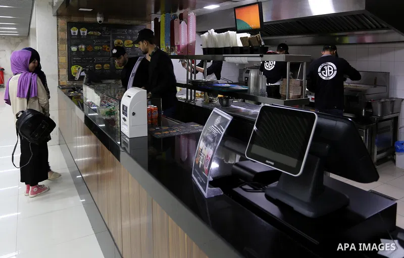 Palestinians shop in a new indoor shopping mall in the Gaza Strip, on February 23, 2017. In a welcome sign of normalcy, the first-of-its-kind indoor shopping mall -- complete with an international retail chain, three-sto...