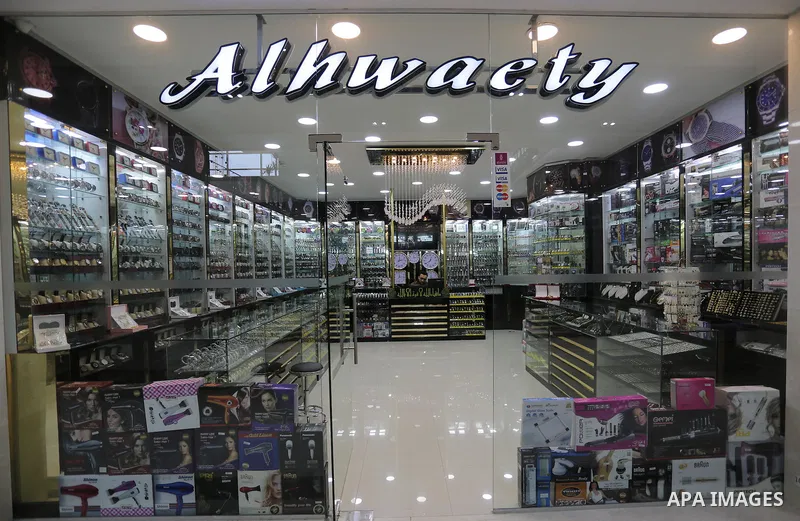 Palestinians shop in a new indoor shopping mall in the Gaza Strip, on February 23, 2017. In a welcome sign of normalcy, the first-of-its-kind indoor shopping mall -- complete with an international retail chain, three-sto...